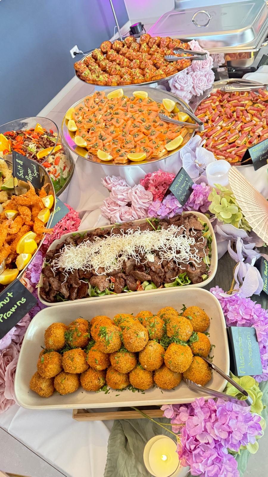 An abundant catering spread of platters and grazing boards