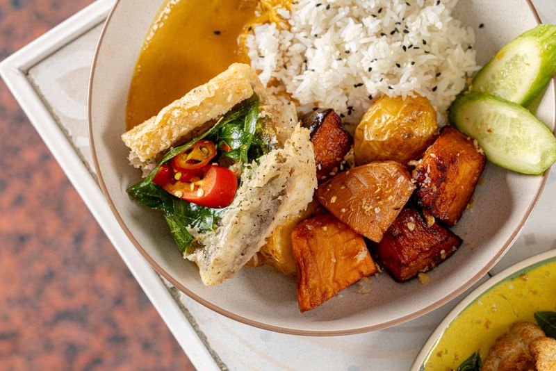 Yellow barramundi curry with jasmine rice