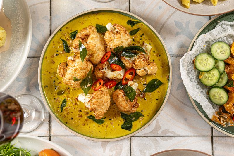Roasted cauliflower in sweet yellow curry