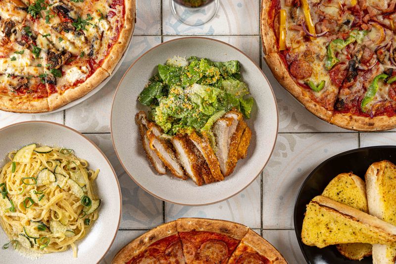 Crunchy caesar salad topped with hand-crumbed schnitzel