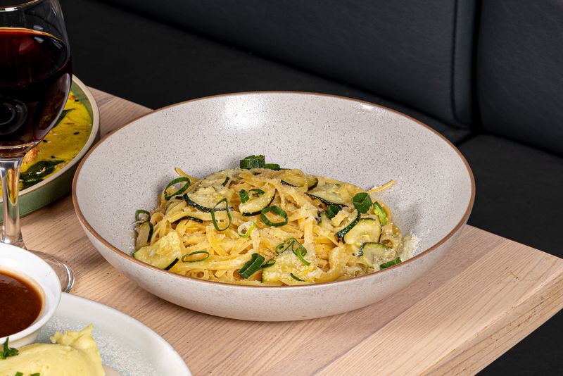 Creamy zucchini pasta with spring onion